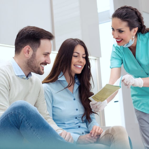 a couple in the process of learning about tooth extraction